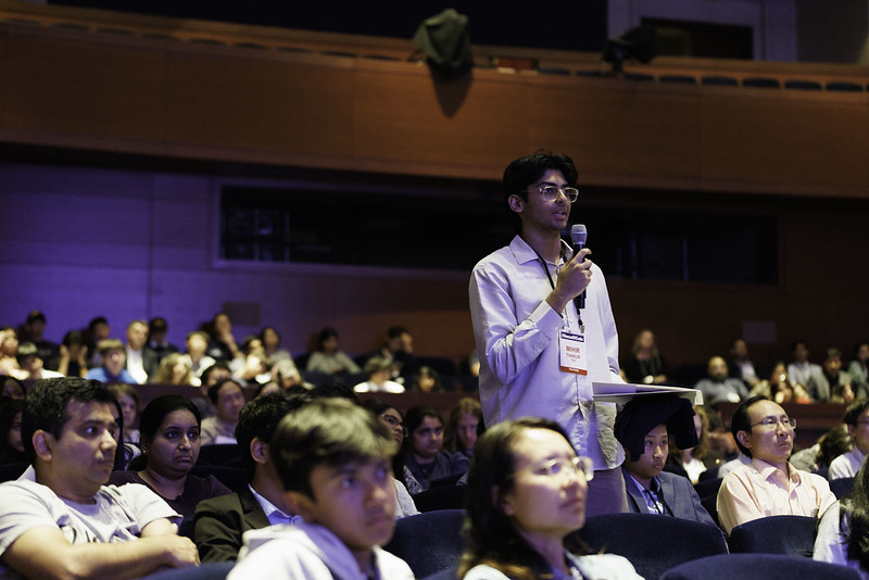 An App Challenge winner asks a question during keynotes